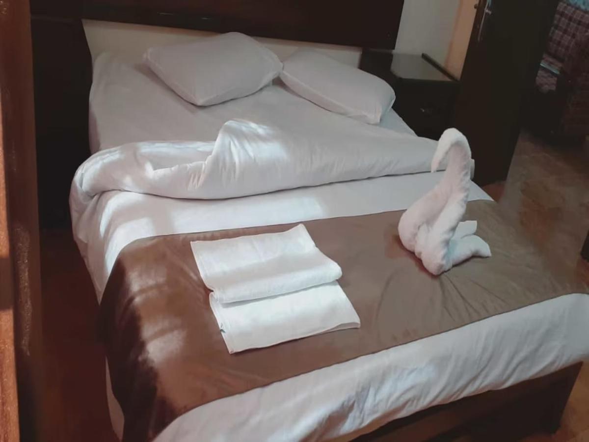 Al-Nujoom Hotel Suites 安曼 外观 照片
