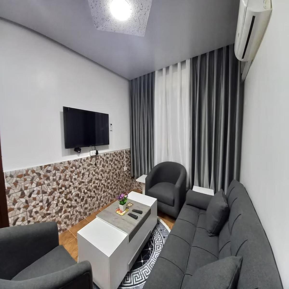 Al-Nujoom Hotel Suites 安曼 外观 照片