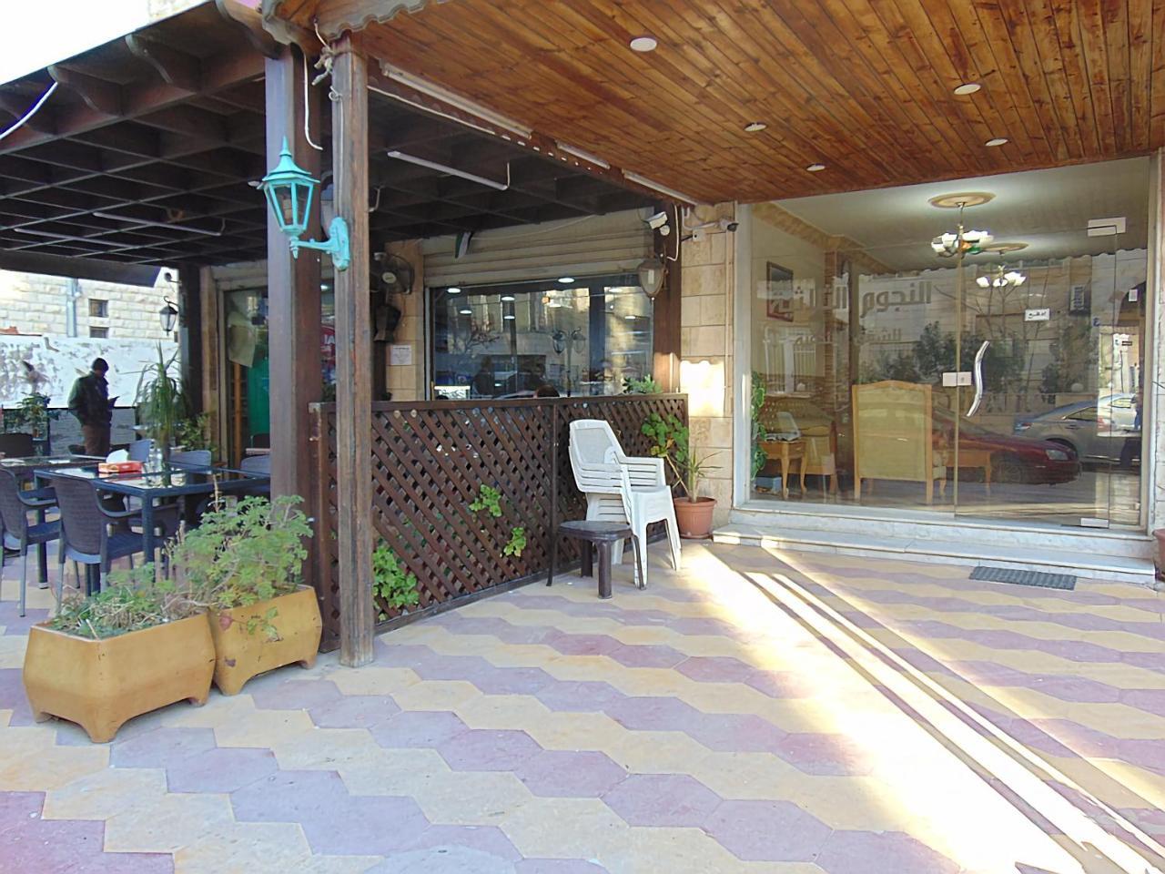 Al-Nujoom Hotel Suites 安曼 外观 照片